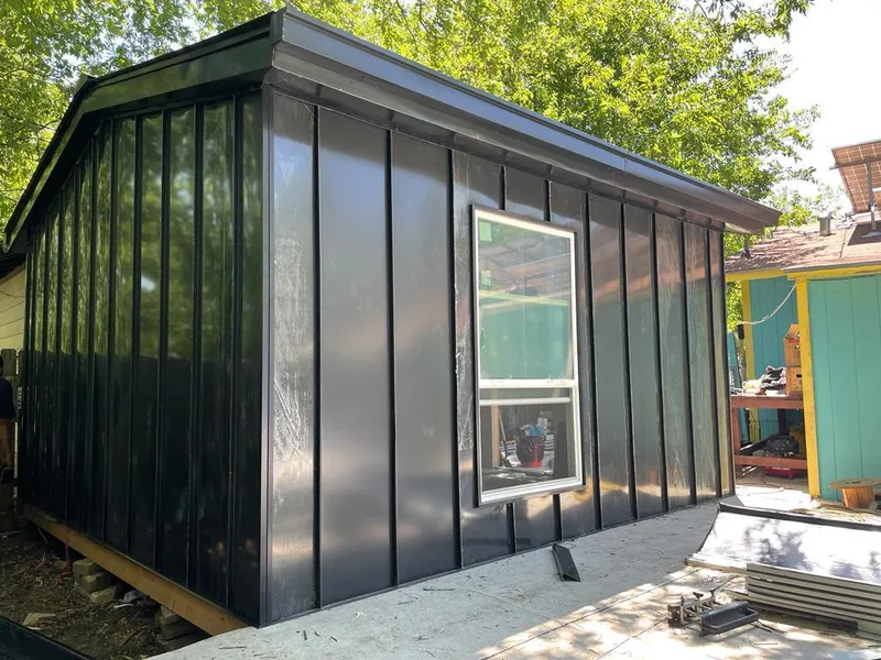 Black standing seam metal wall panels for Roof Inspection in Hilltown