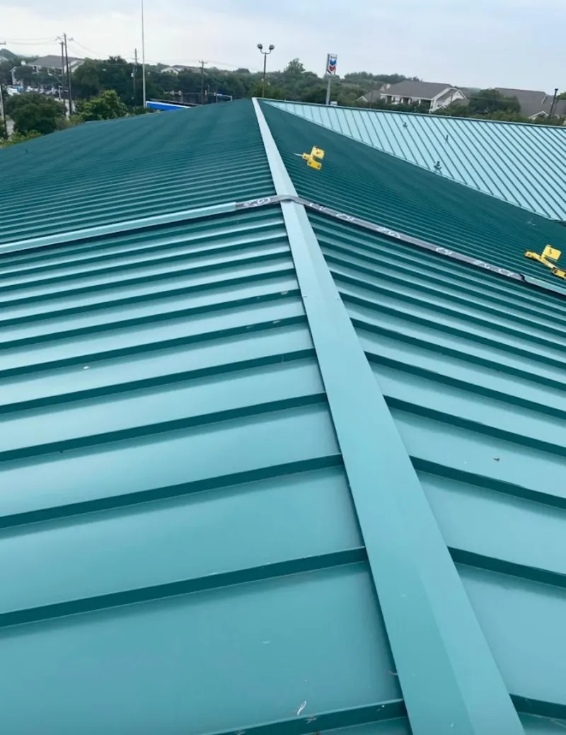 Green commercial metal roof ridge and valley for Metal Roof Repair in Hilltown